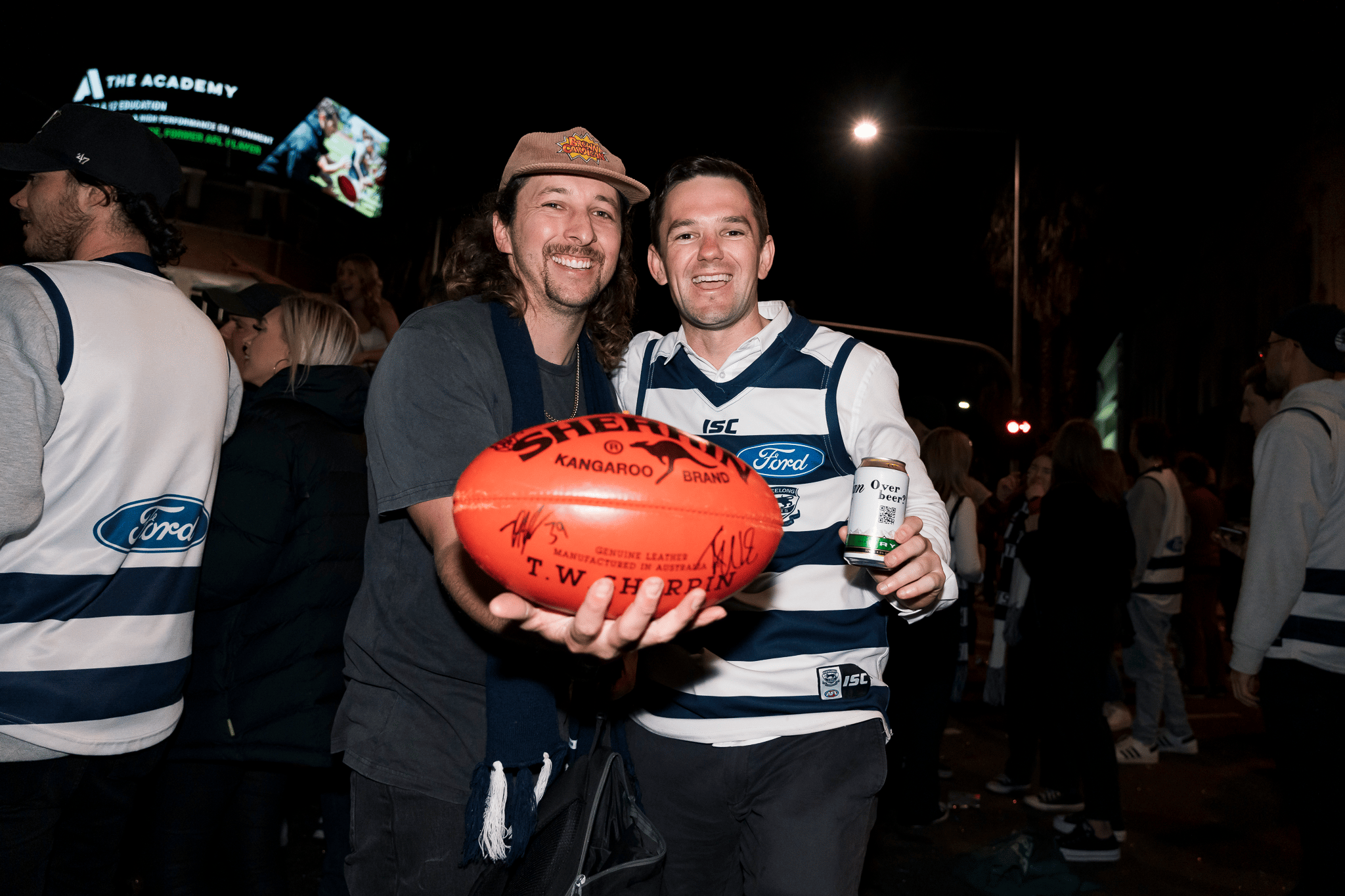 Geelong Cats supporters celebrate 2022 Grand Final win.